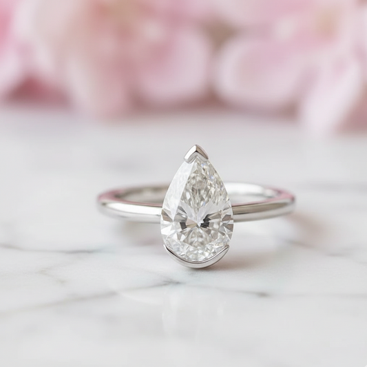 1.25 ct Pear Moissanite Engagement Ring - Elegant Solitaire