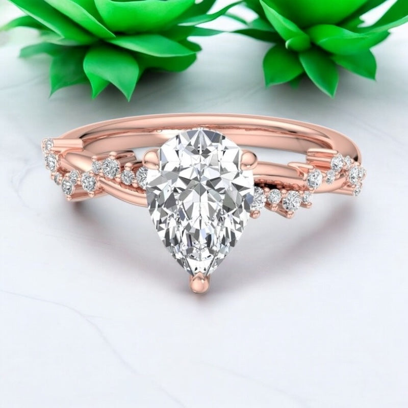 Timeless Elegance: 1.50ct Pear Shaped Lab Grown Diamond Infinity Engagement Ring by Amávida Jewels