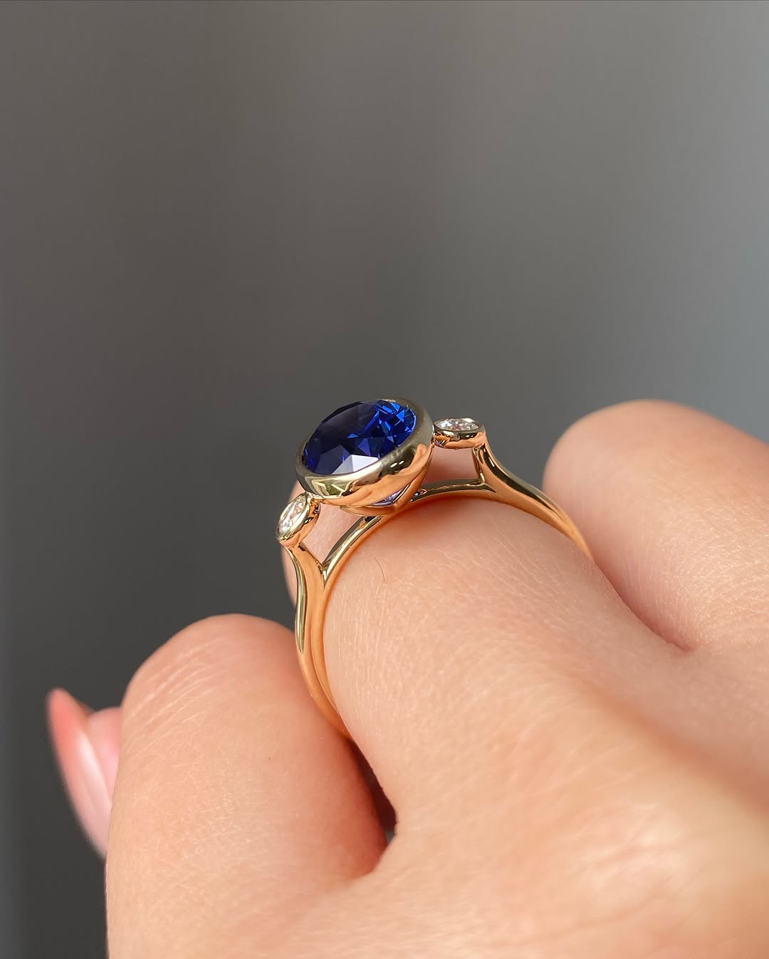 Blue Sapphire Oval Birthstone Bezel Setting Three Stone Engagement Ring