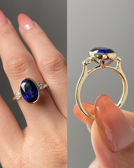 Blue Sapphire Oval Birthstone Bezel Setting Three Stone Engagement Ring