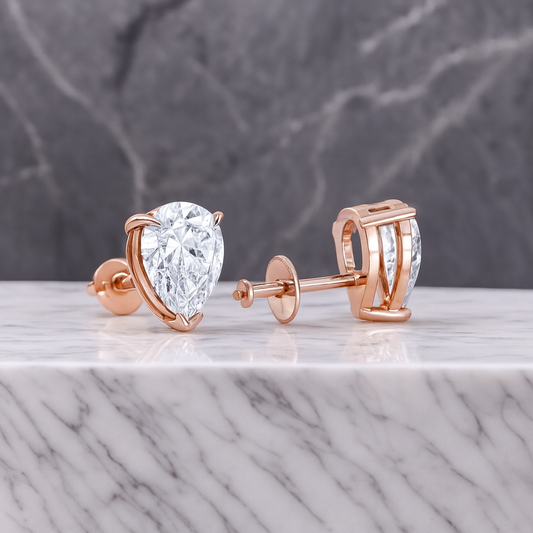 2 Ct Pear Cut Lab Grown Diamond Stud Earrings • 14K Rose Gold Basket Setting