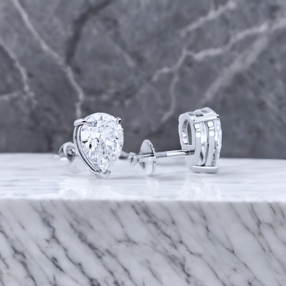 2 Ct Pear Cut Lab Grown Diamond Stud Earrings • 14K Rose Gold Basket Setting