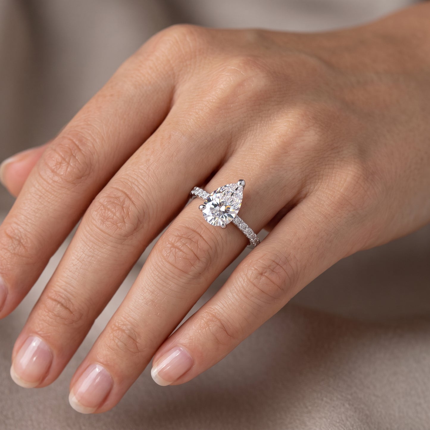 1.50ct Pear Cut Solitaire Engagement Ring with Hidden Halo Pave Setting