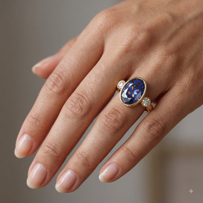 Blue Sapphire Oval Birthstone Bezel Setting Three Stone Engagement Ring