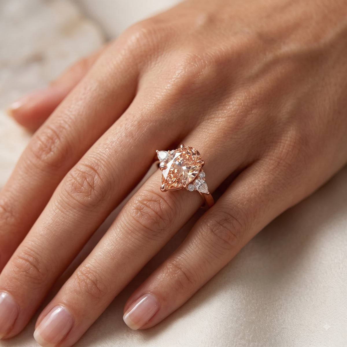 2.0ct Pear Shaped Morganite Three Stone Engagement Ring