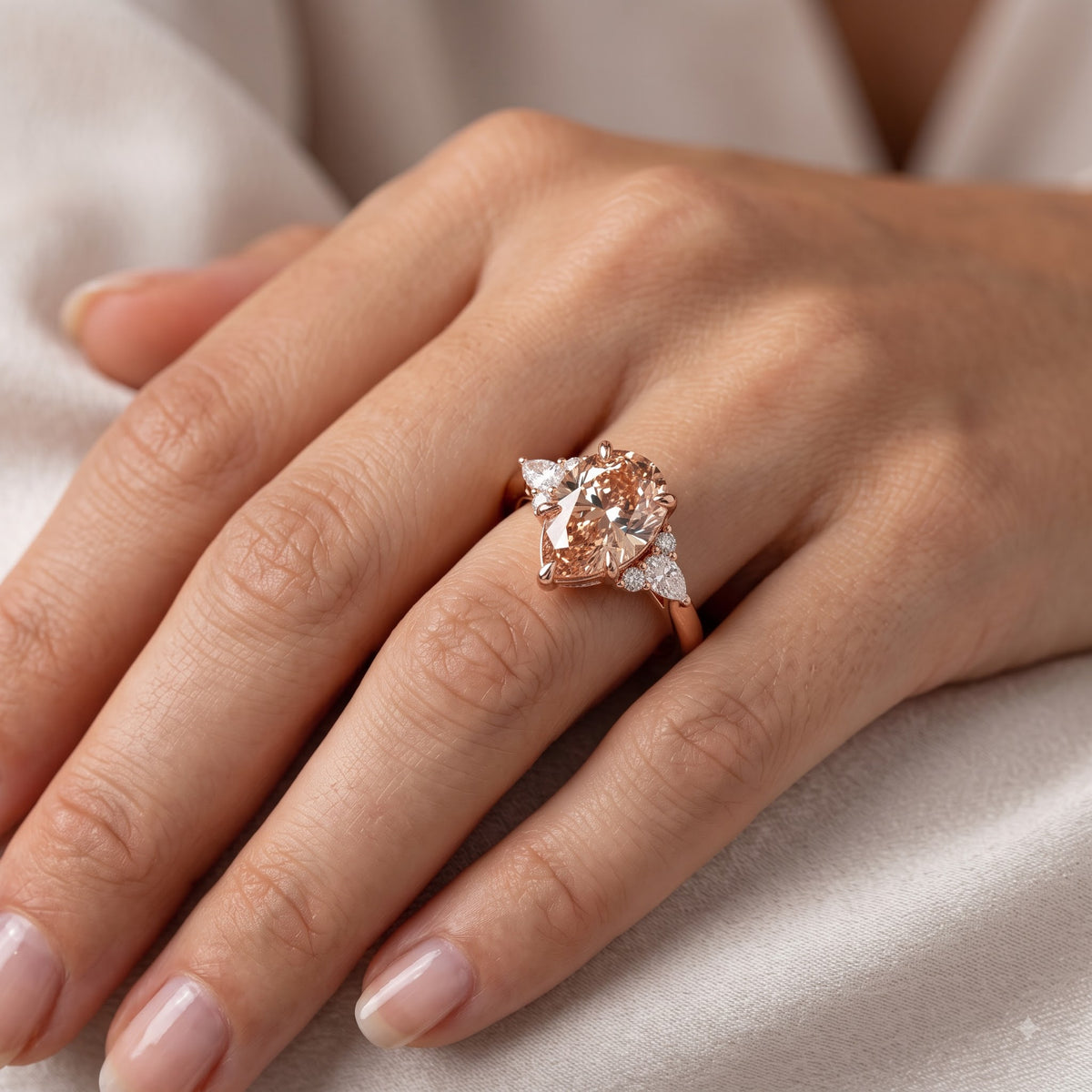 2.0ct Pear Shaped Morganite Three Stone Engagement Ring