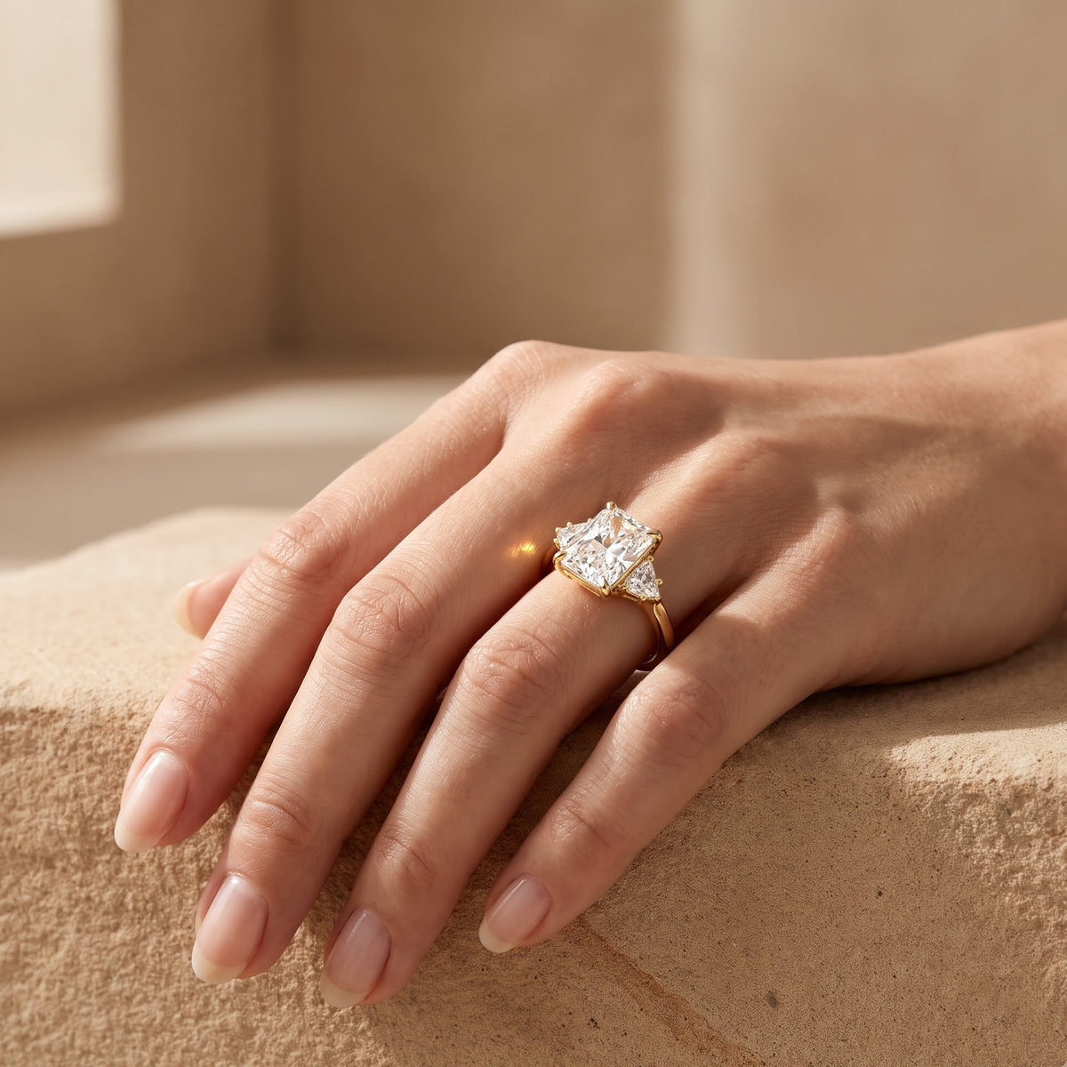 three stone engagement ring gold​

