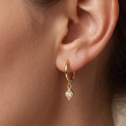 gold earrings dangle​

