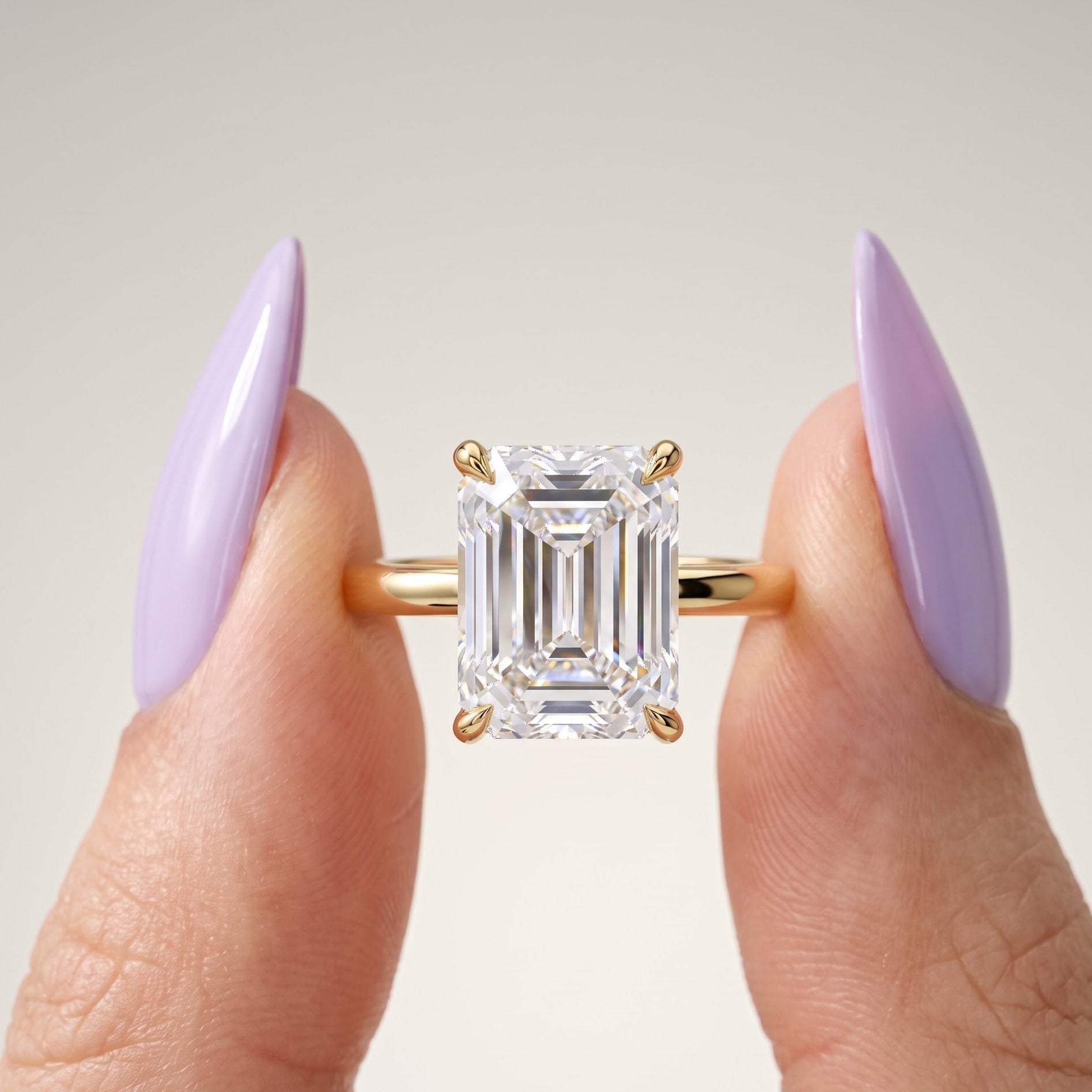 gold emerald engagement ring​

