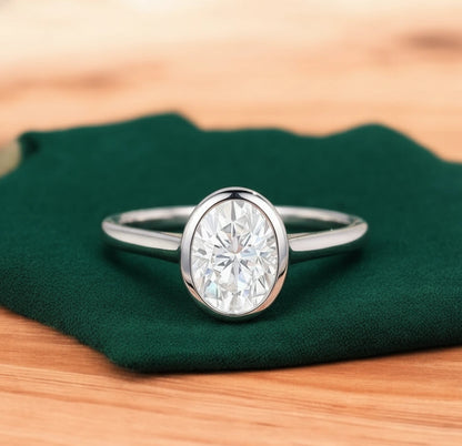 pear shaped bezel set engagement rings
