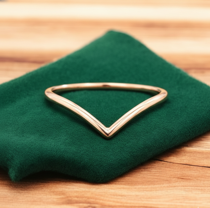 gold curved ring
