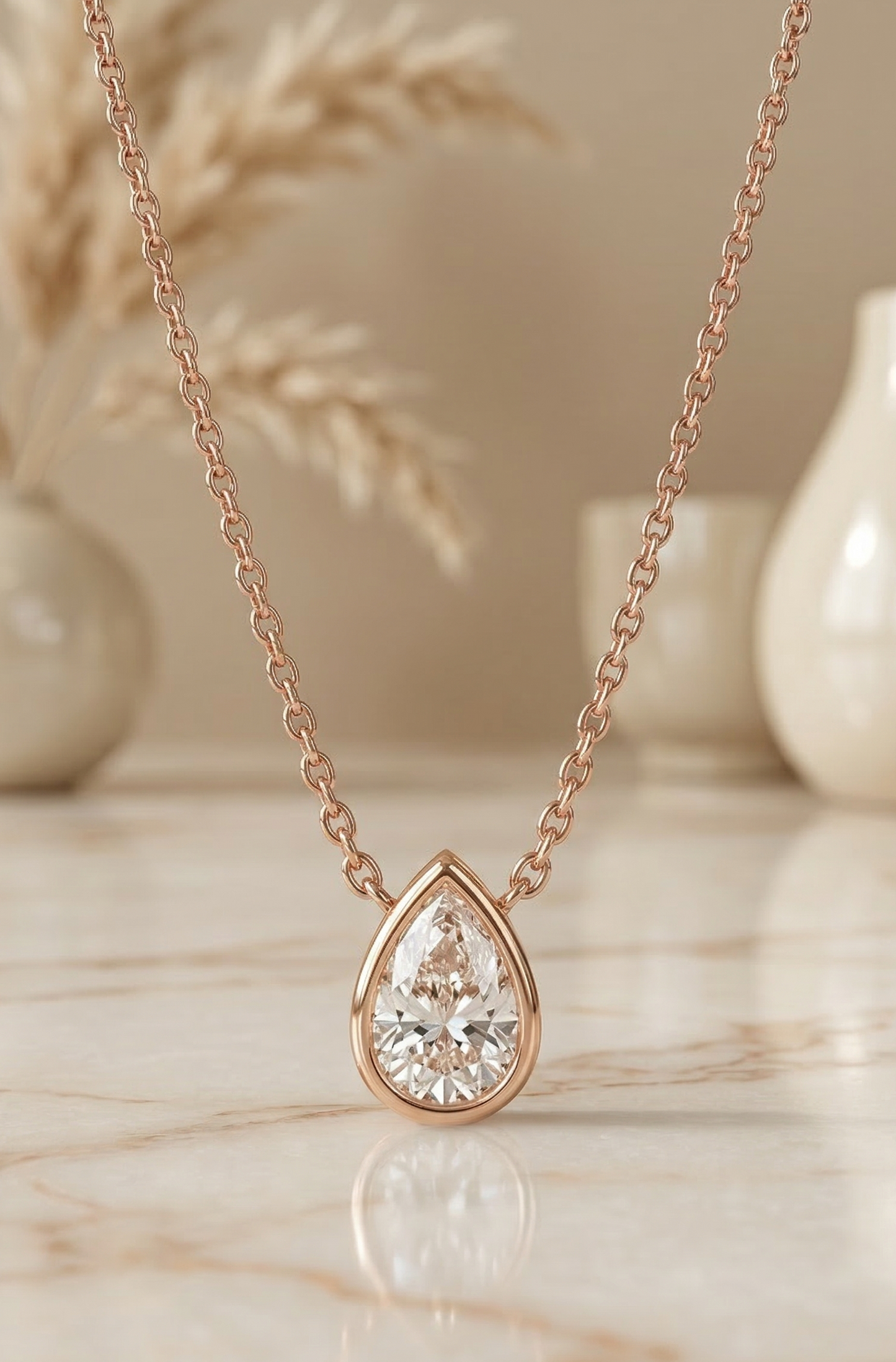 bezel set pear shaped diamond pendant​

