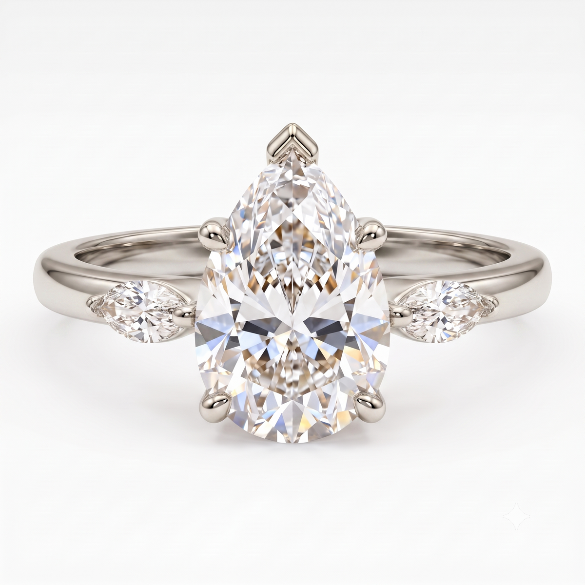 pear shaped diamond three stone ring