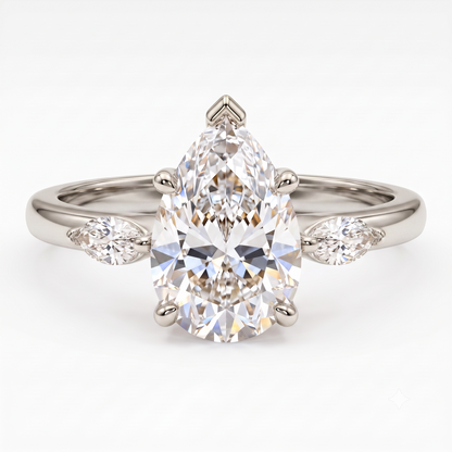 pear shaped diamond three stone ring
