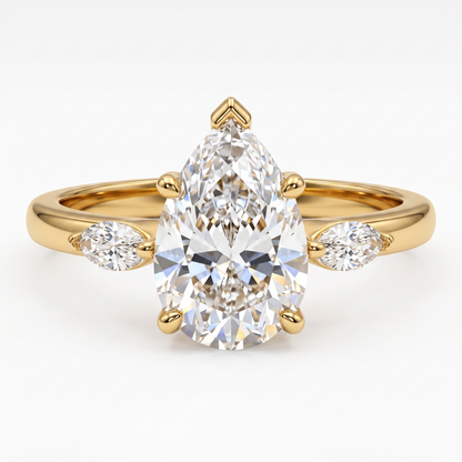 pear cut three stone engagement ring