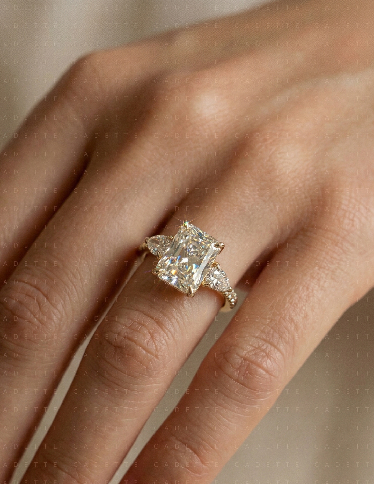 three stone radiant engagement ring​

