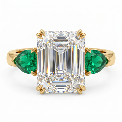 three stone emerald cut diamond ring​

