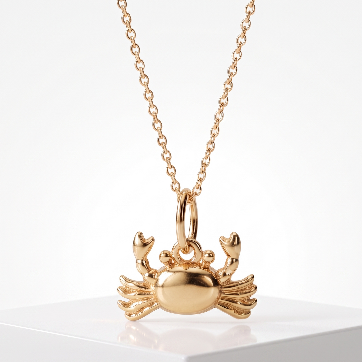 gold crab necklace​

