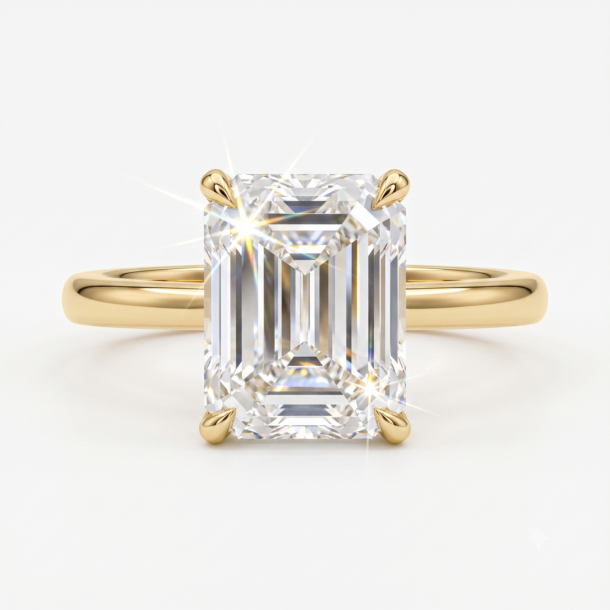 emerald solitaire engagement ring​

