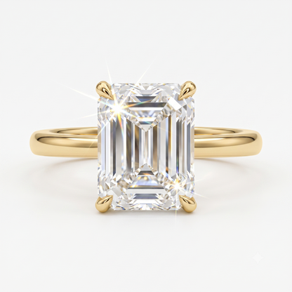 emerald solitaire engagement ring​


