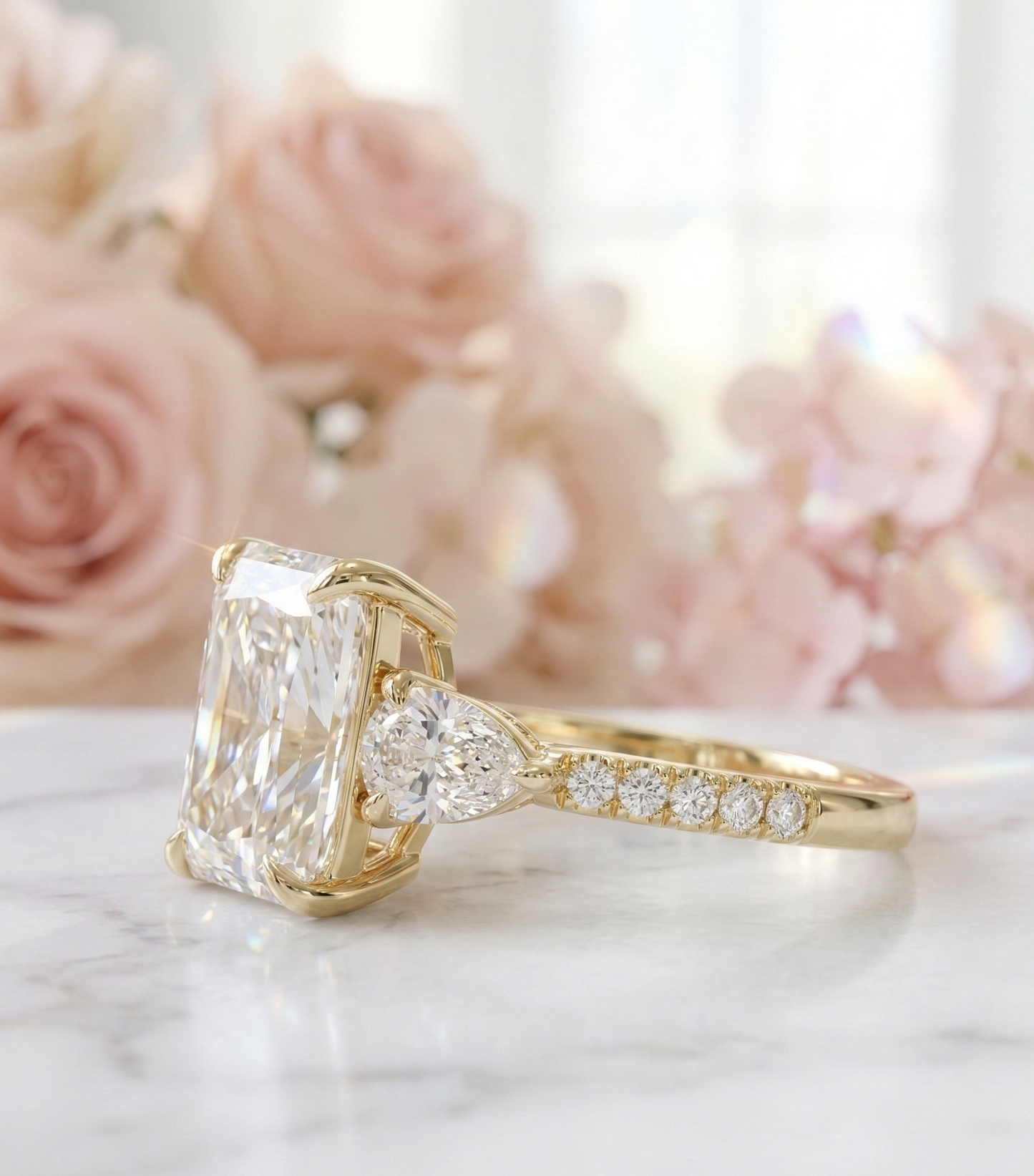 radiant three stone engagement ring​

