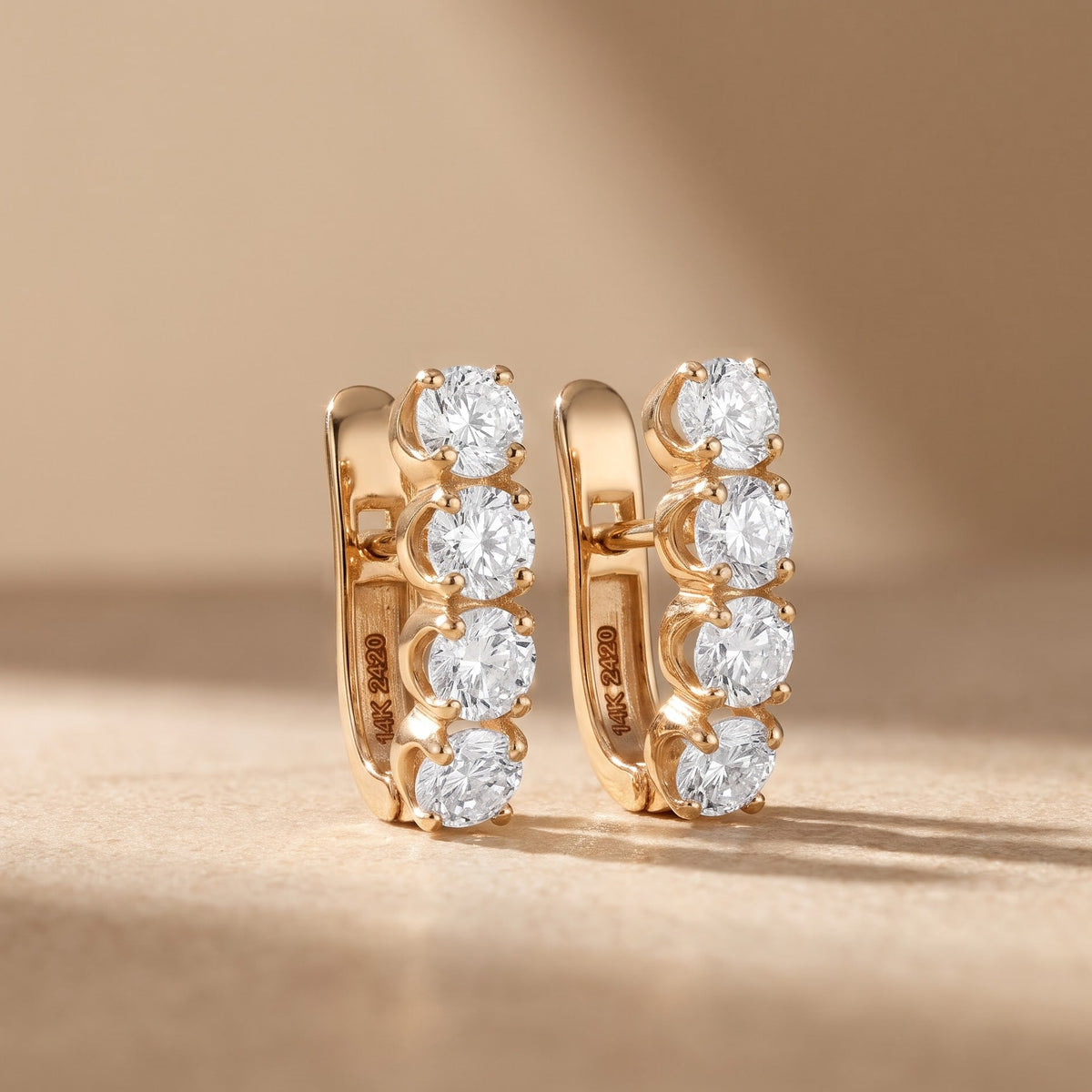 earrings huggie hoops​

