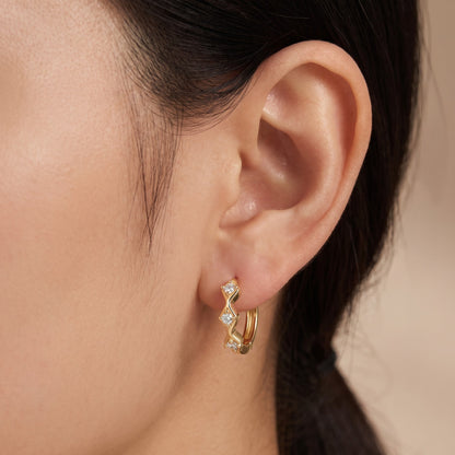 huggie gold hoop earrings​

