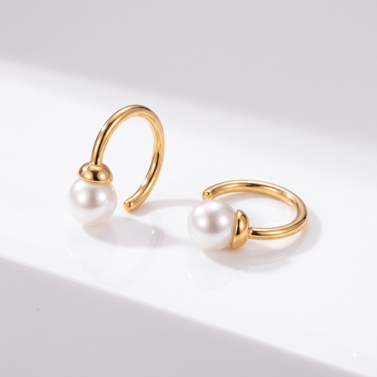 gold hoop earring with pearl​

