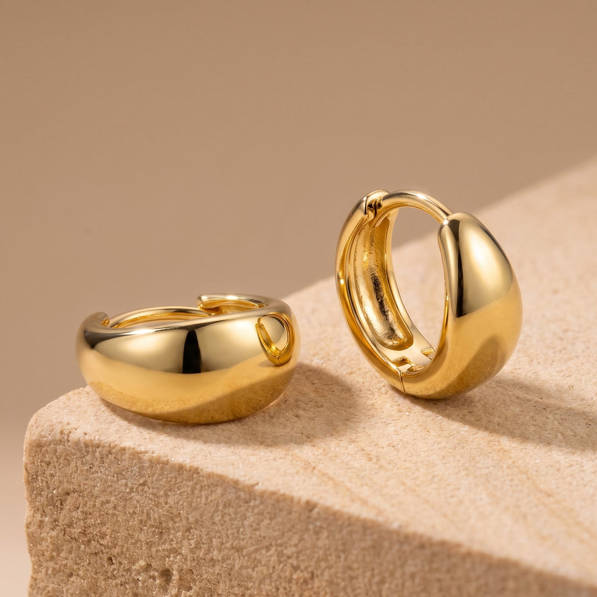 chunky gold stud earrings​

