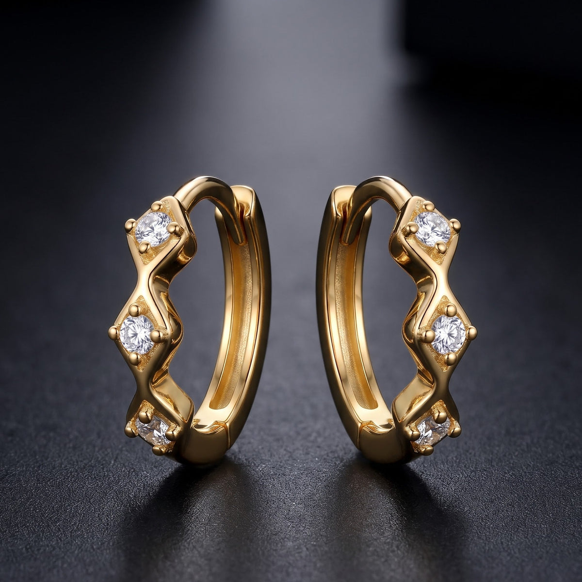 huggie gold hoop earrings​

