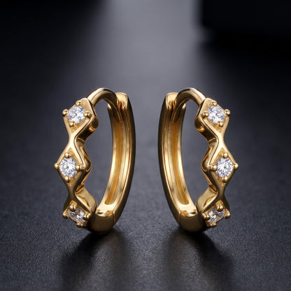 huggie gold hoop earrings​

