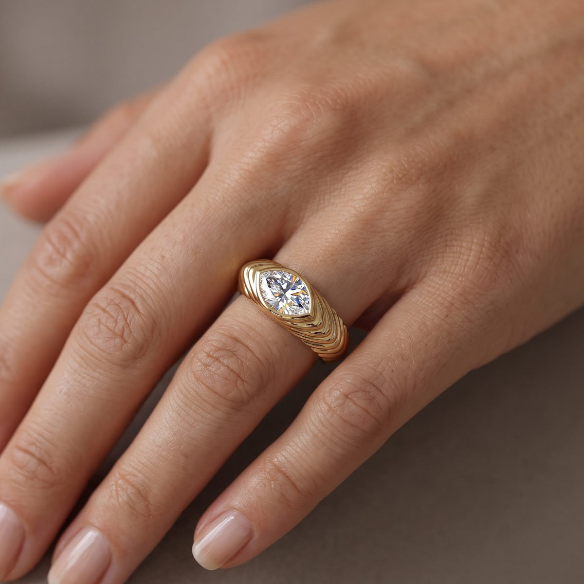 gold marquise engagement ring​

