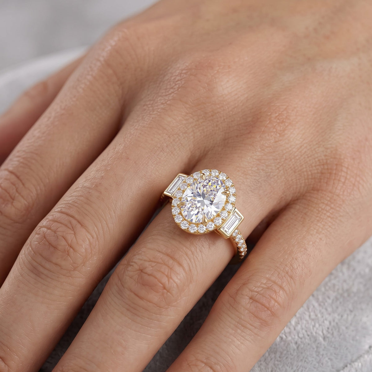 gold oval halo engagement ring​


