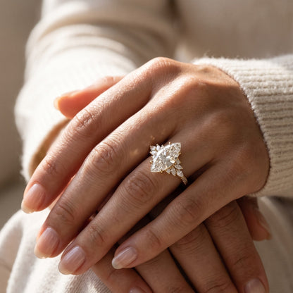 gold marquise engagement ring​

