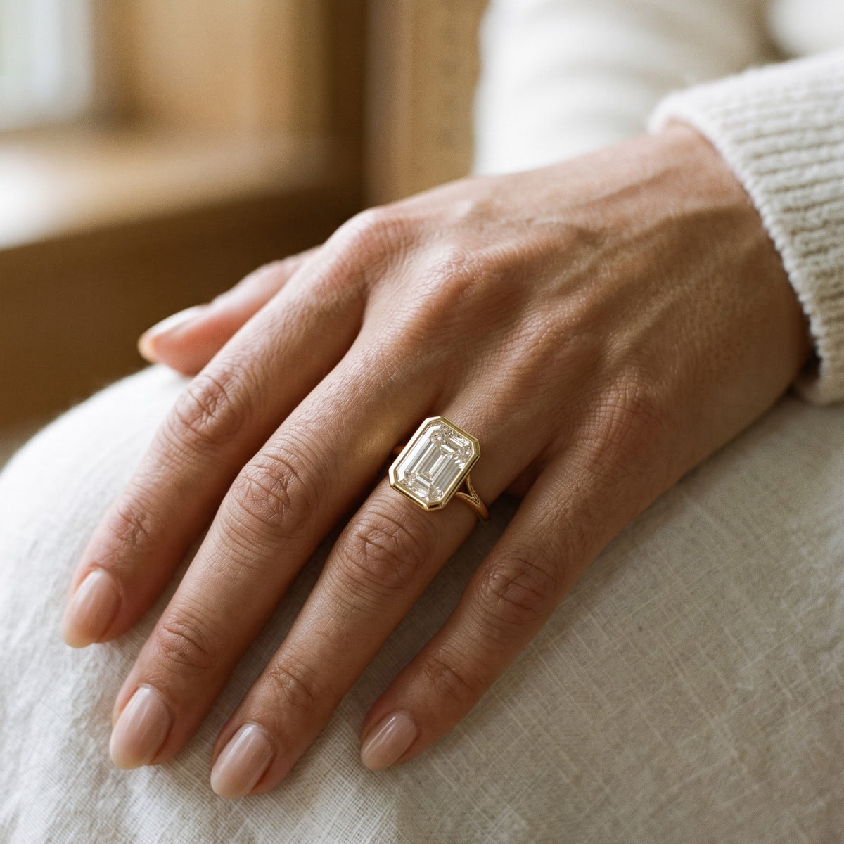 emerald cut gold diamond ring​

