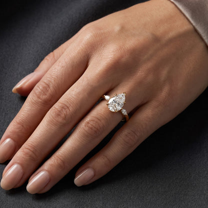 pear cut three stone bridal ring