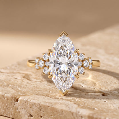 gold marquise engagement ring​

