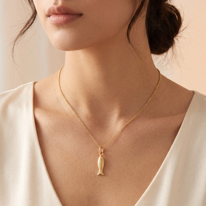 14k gold fish pendant​

