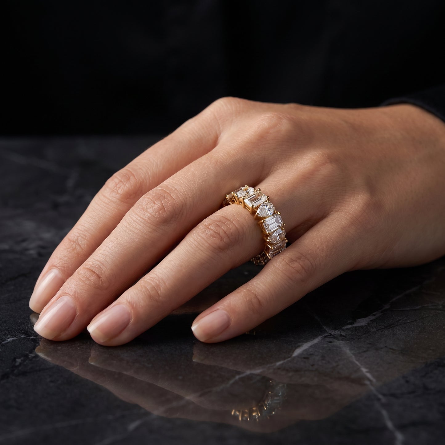 pear shaped emerald and diamond ring​

