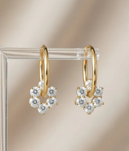 gold hoops with flowers
