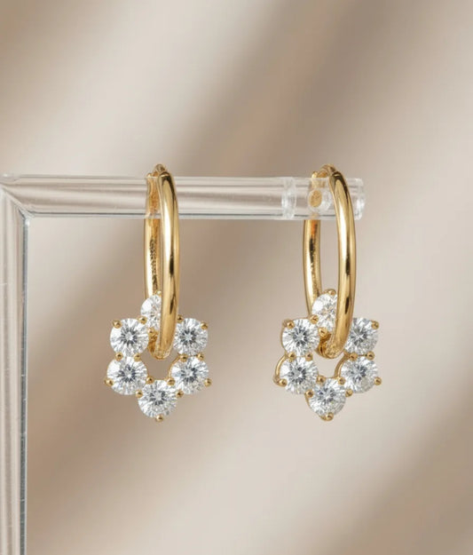 gold hoops with flowers
