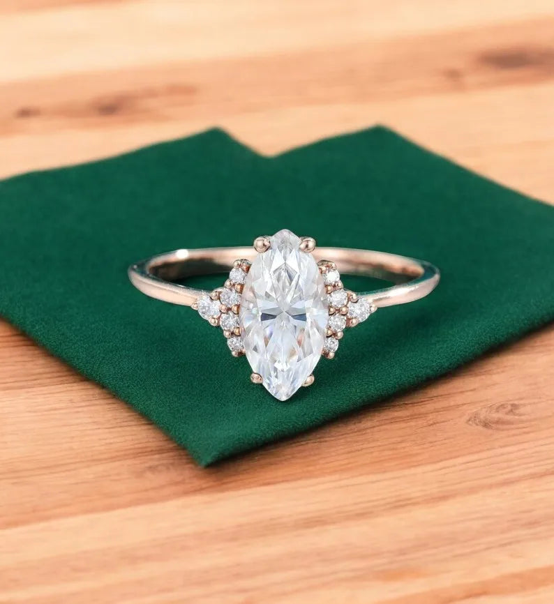 solitaire marquise engagement ring
