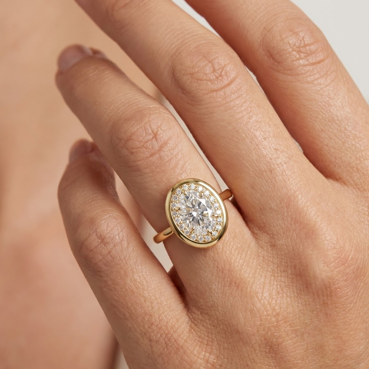 oval halo engagement rings yellow gold​

