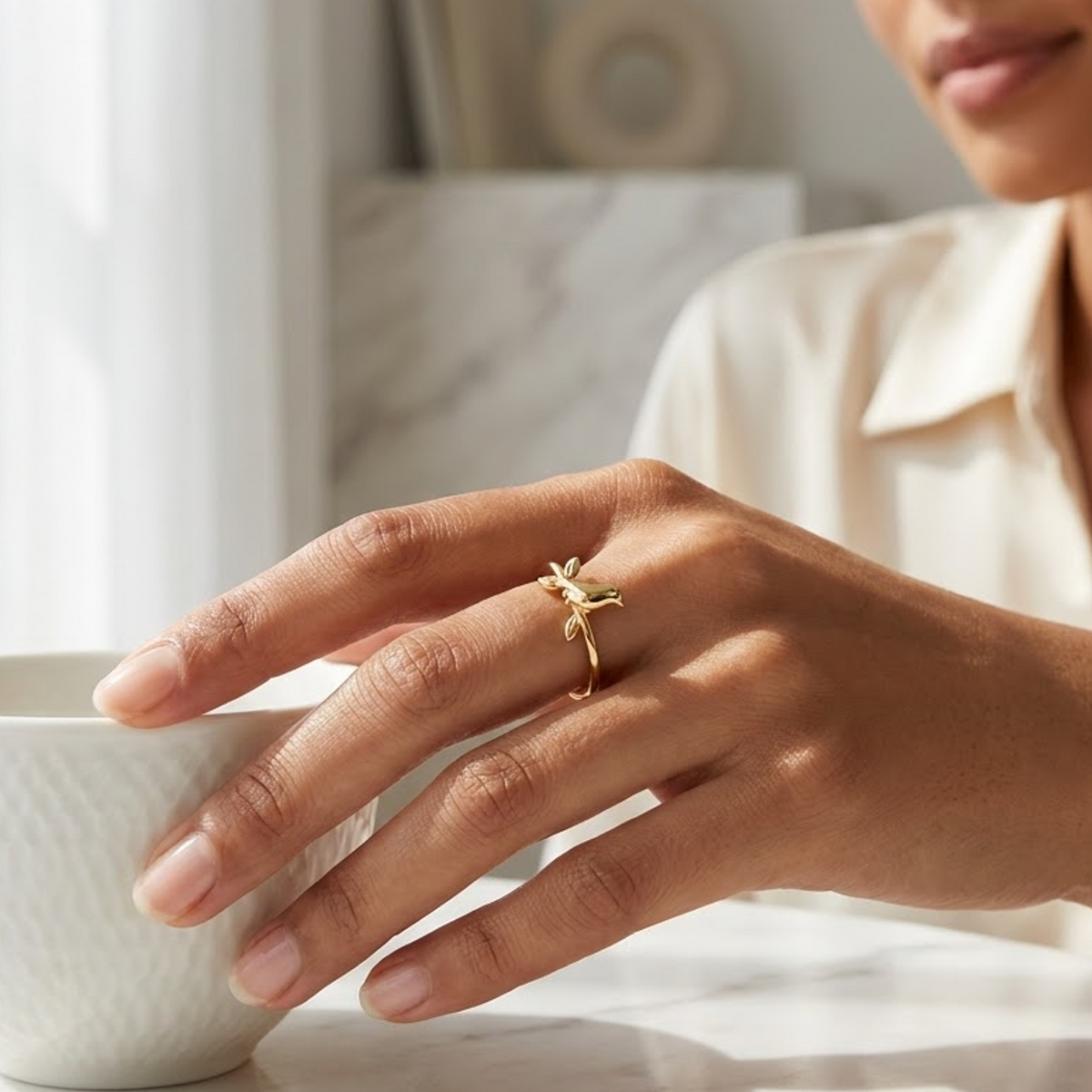 gold bird ring​

