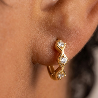 huggie gold hoop earrings​

