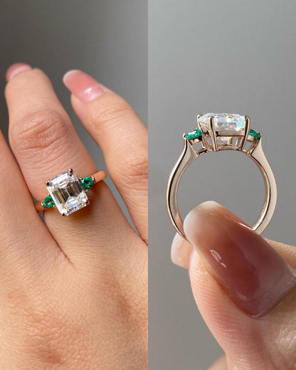 three stone emerald cut engagement ring with wedding band​

