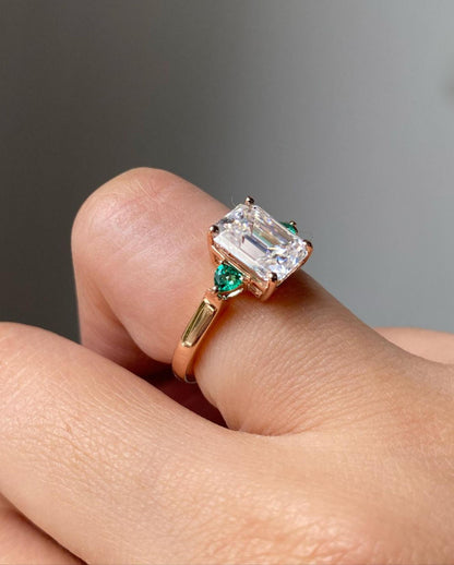 emerald and diamond three stone ring​

