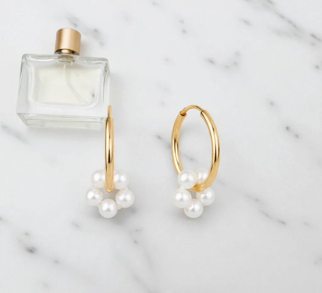 gold hoop and pearl earrings
