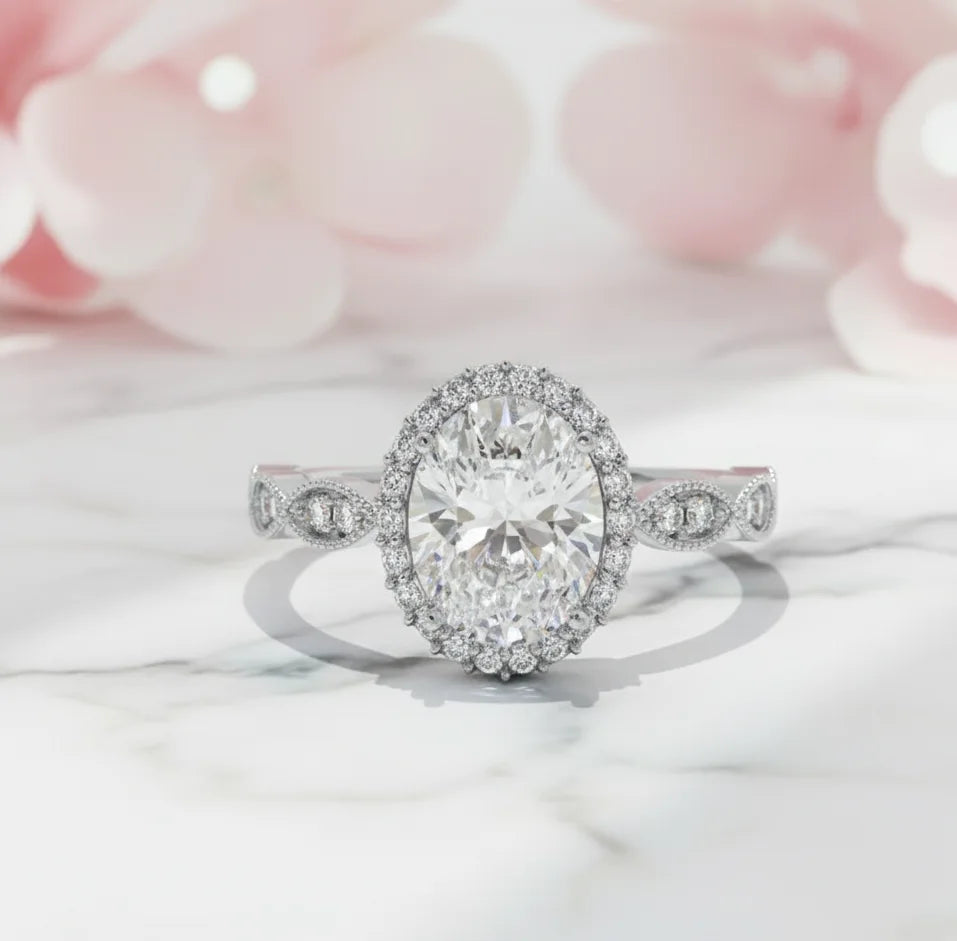 white gold oval halo engagement ring
