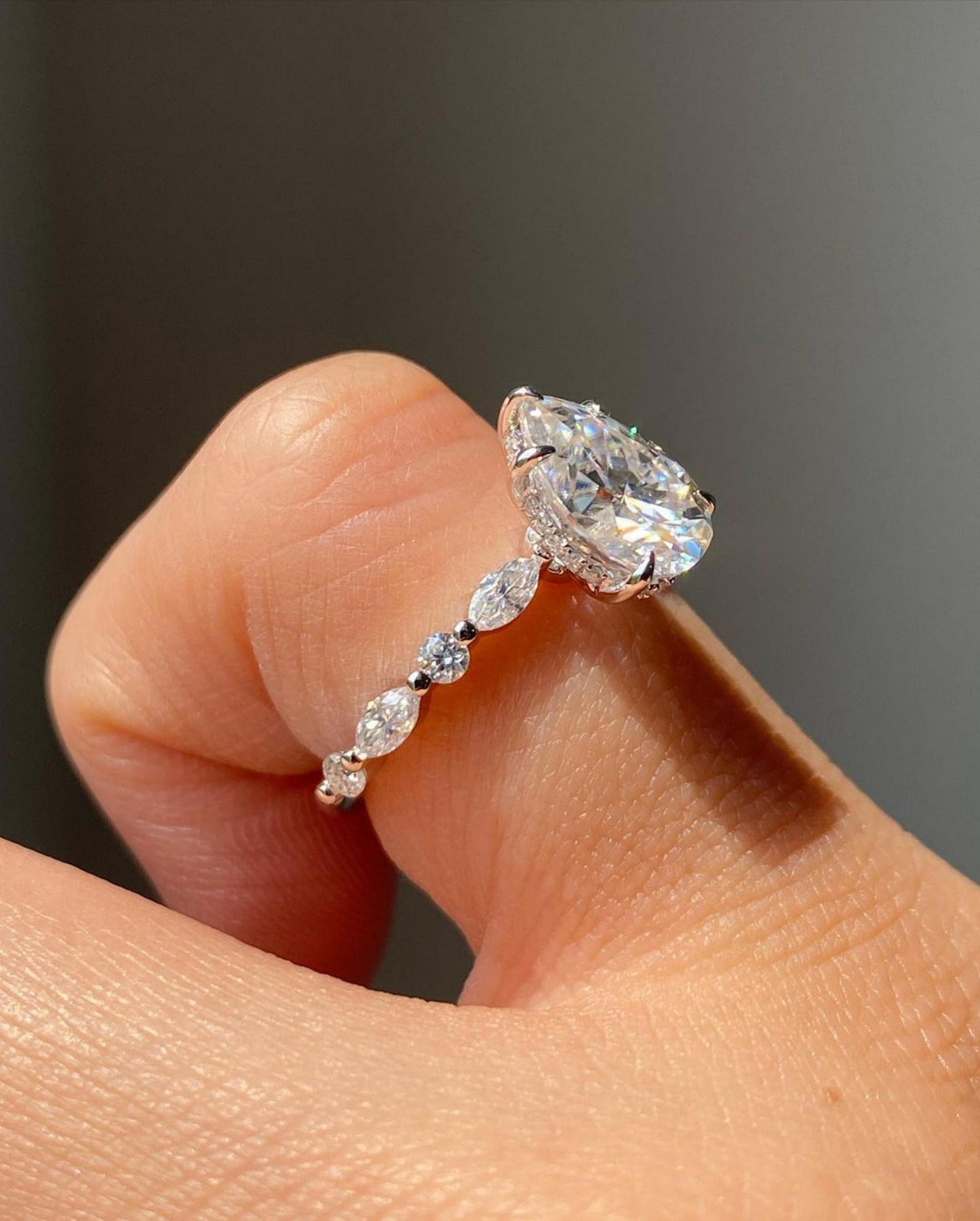 Pear shaped Moissanite engagement ring